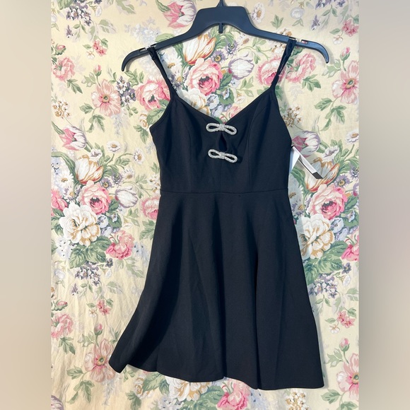 City Studio Dresses & Skirts - City Studio Black Mini Dress with Silver Bow Accents